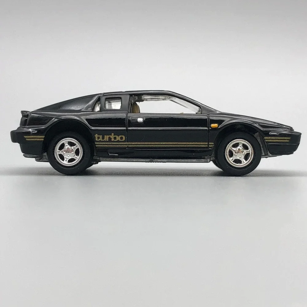 Johnny Lightning 1977 Lotus Esprit Turbo S1 Diecast Car Black Diecast 1/64 Scale